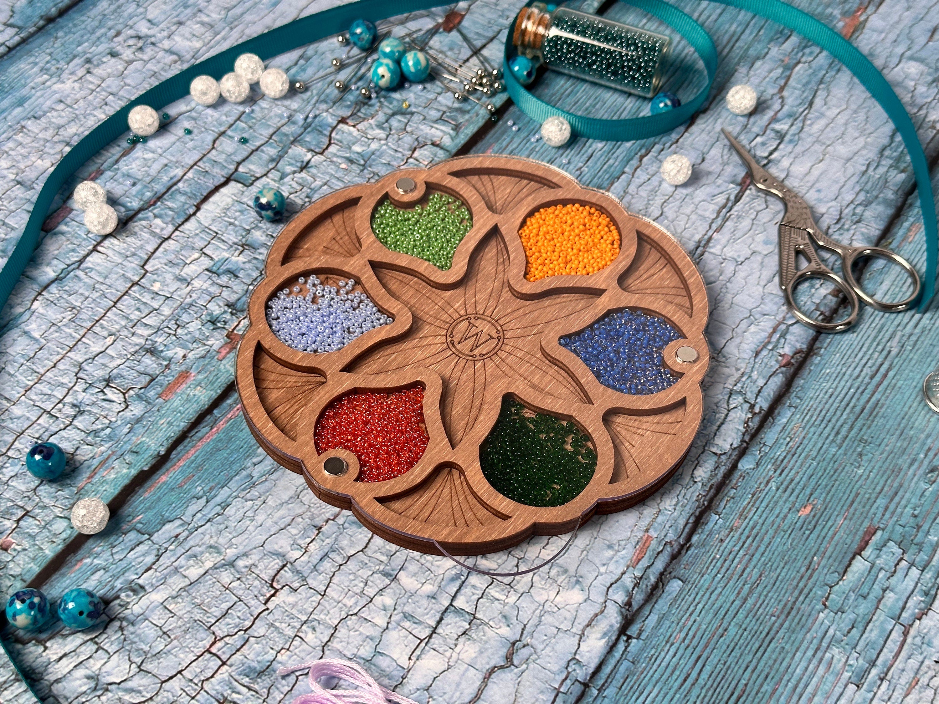 a necklace with beads and beads on a table